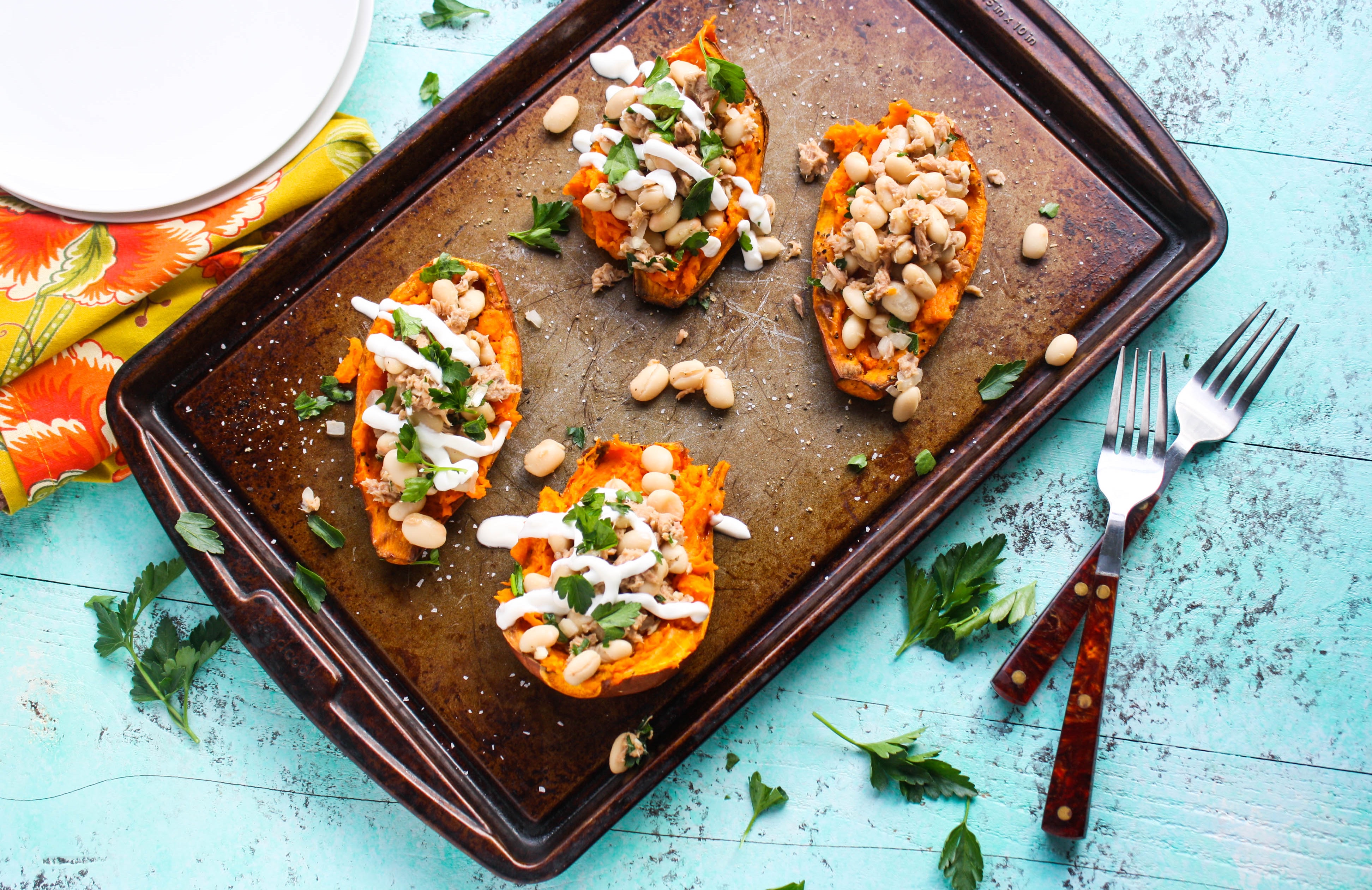 Stuffed Sweet Potatoes with Tuna and Beans make a fabulous meatless meal. These stuffed sweet potatoes are perfect along with the tuna and beans. 