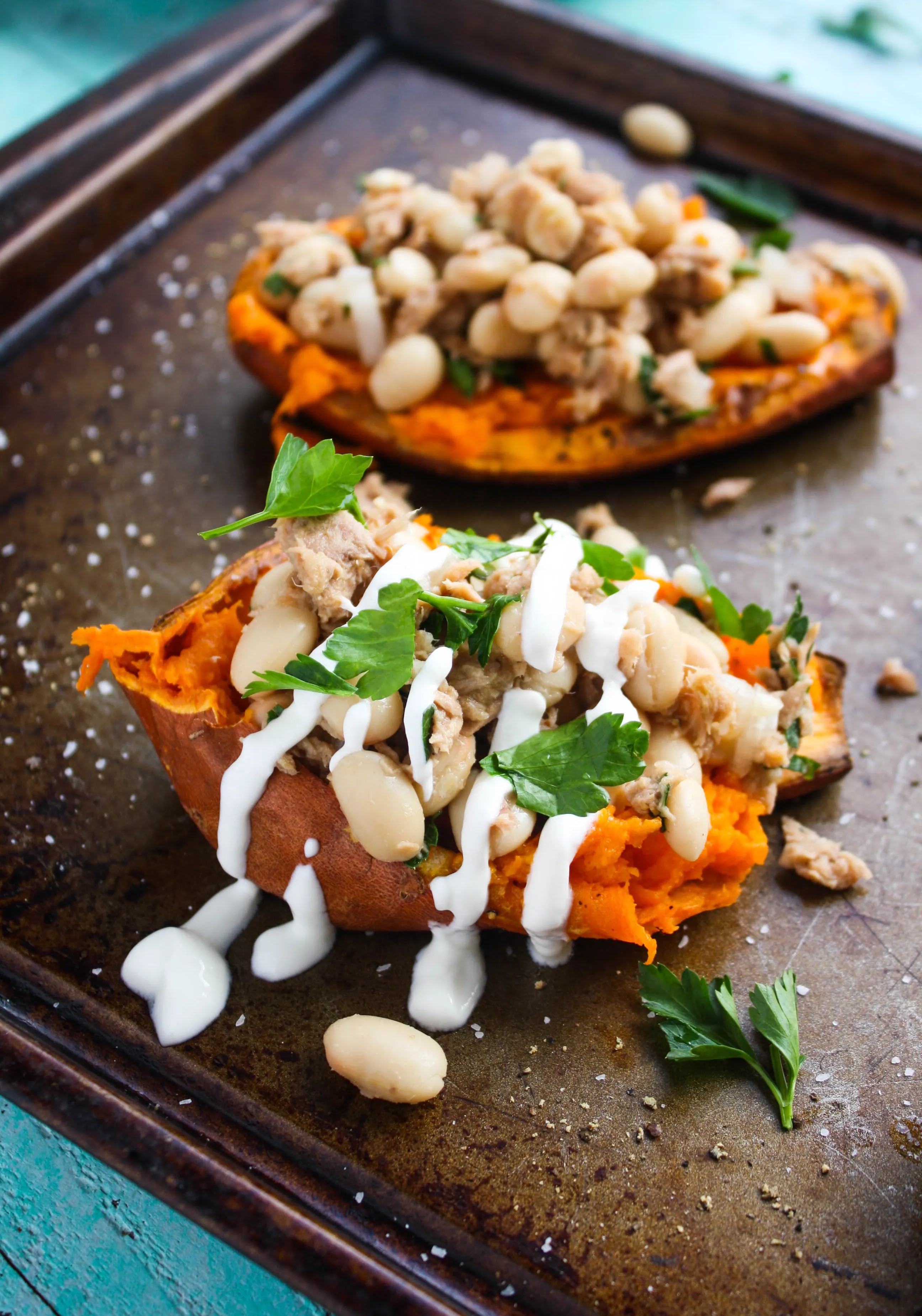 Stuffed Sweet Potatoes with Tuna and Beans make a fabulous go-to meal when you want something without the fuss. These stuffed sweet potatoes are delicious!