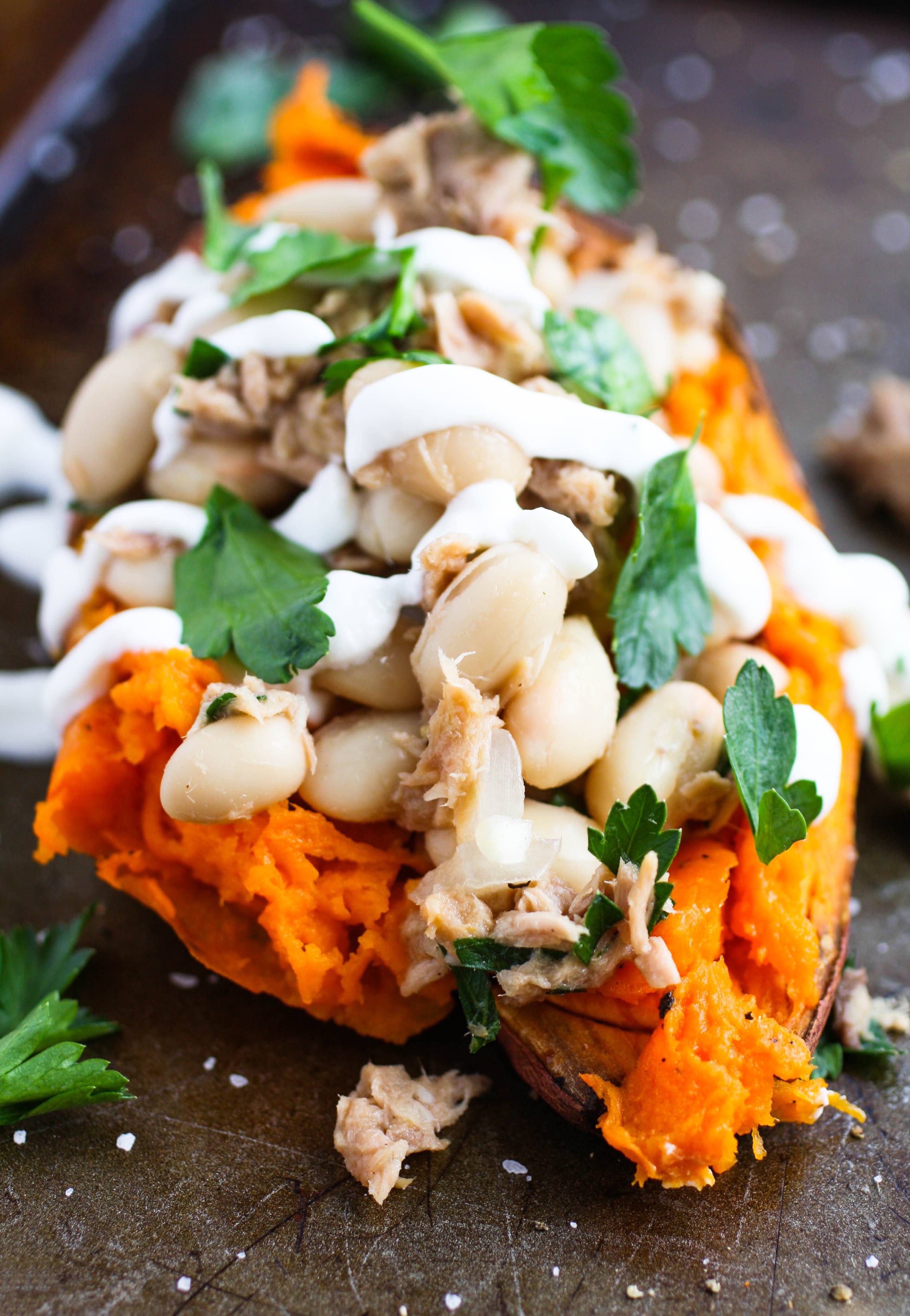 Stuffed Sweet Potatoes with Tuna and Beans make a tasty, simple dish. Stuffed Sweet Potatoes with Tuna and Beans are perfect for your next meatless meal.