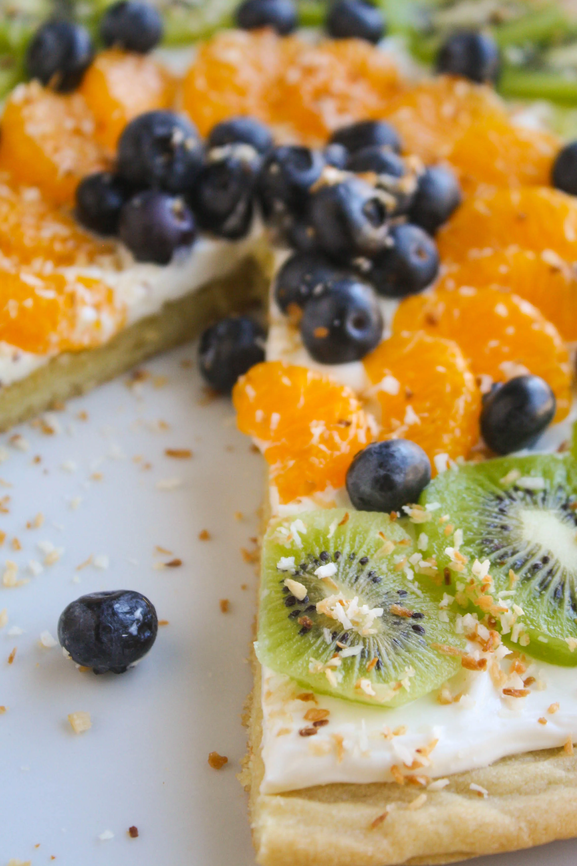 Sugar Cookie Fruit Pizza is a delicious dessert! You'll want more than one slice of this sugar-cookie-crust and fruit treat!