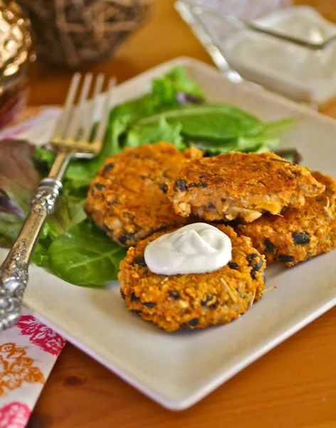 Sweet Potato, Black Bean, and Quinoa Cakes with a dollop of cream