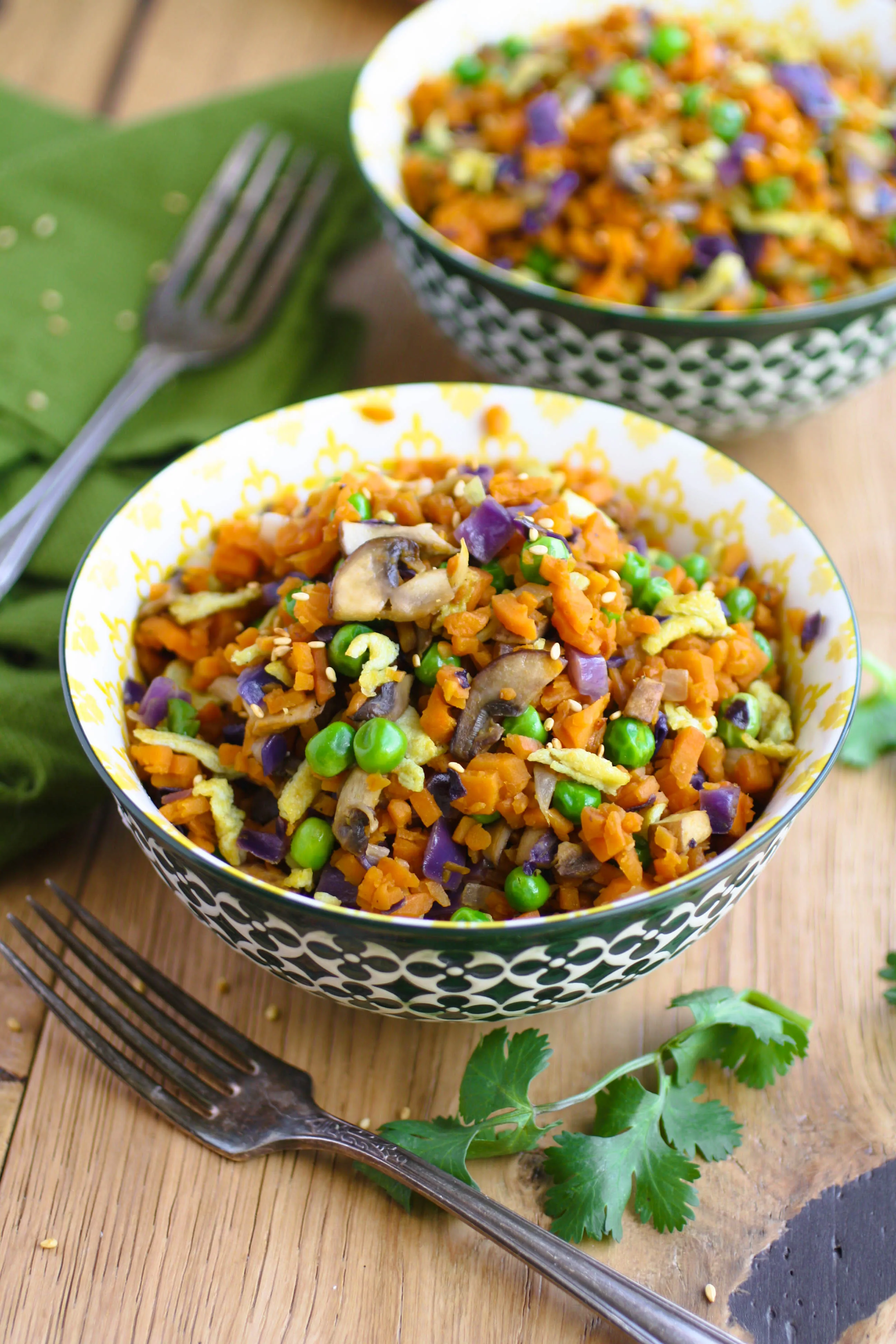 Sweet Potato "Fried Rice" is a colorful and flavorful dish. It makes a fab meatless side dish, or even main dish!