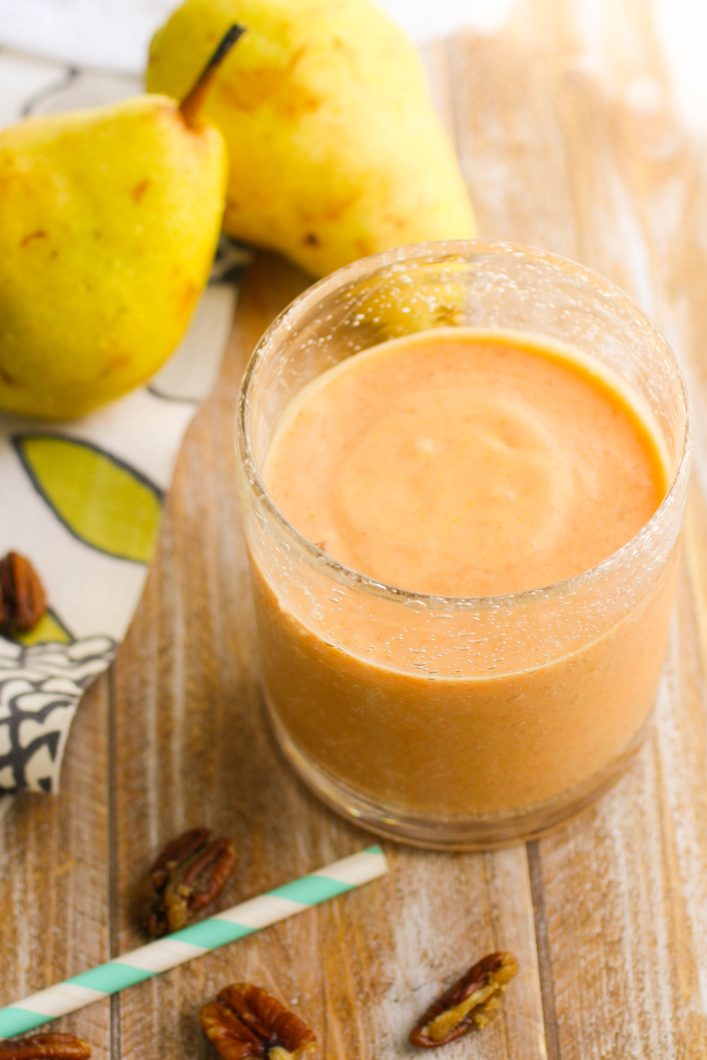 Sweet Potato-Pear Smoothies with Candied Pecans make a tasty and filling breakfast (and are good for dessert, too)! These fall-inspired smoothies are delicious!
