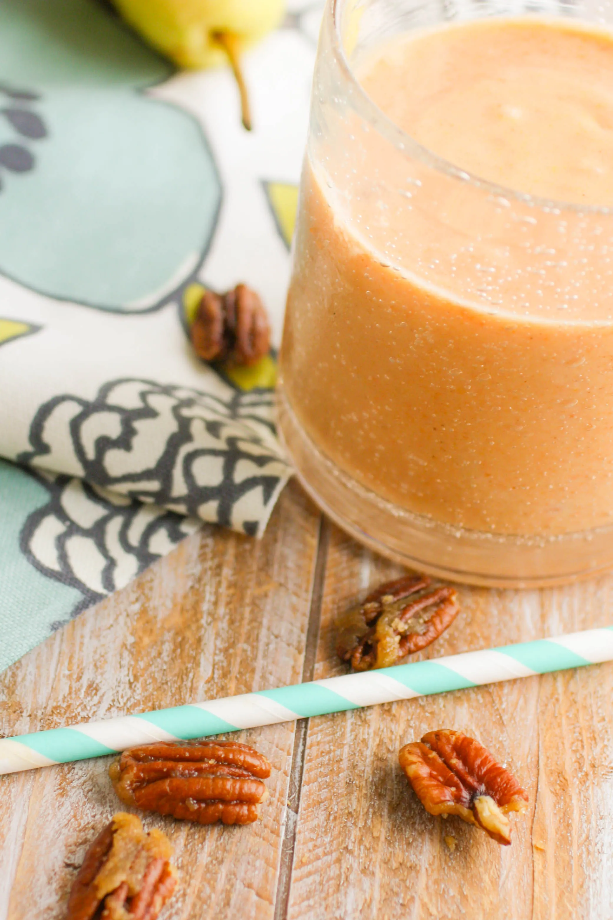 Sweet Potato-Pear Smoothies with Candied Pecans make a fabulous fall breakfast. You'll love the fall-inspired ingredients in these smoothies!