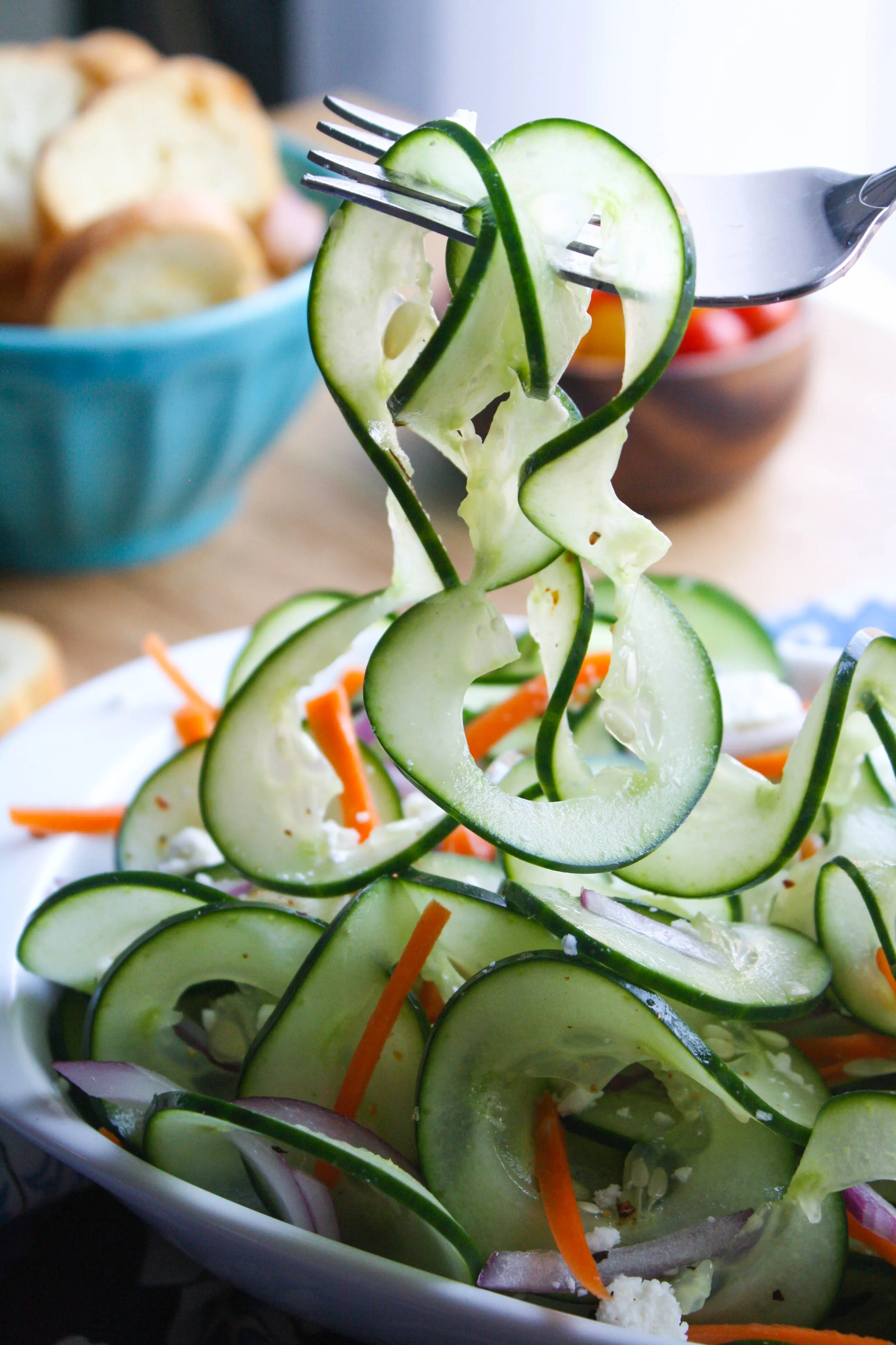 Sweet and Tangy Cucumber Ribbon Salad is an easy-to-make salad. You'll love this side with any meal.