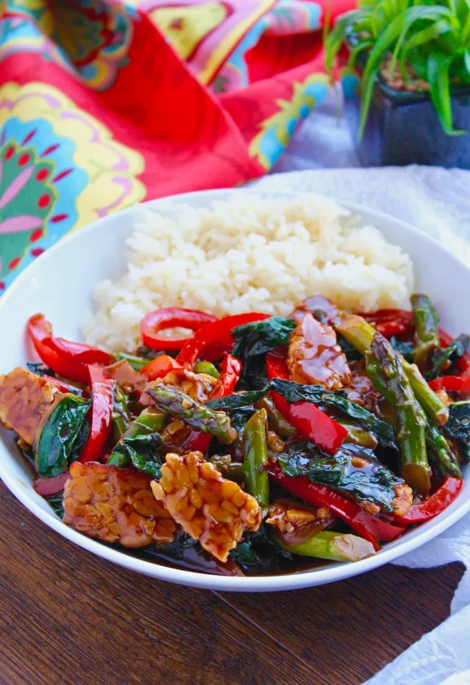 Tempeh and Vegetable Stir-Fry in Teriyaki Sauce is a filling and flavorful dish. You'll love that it's easy to make, too!