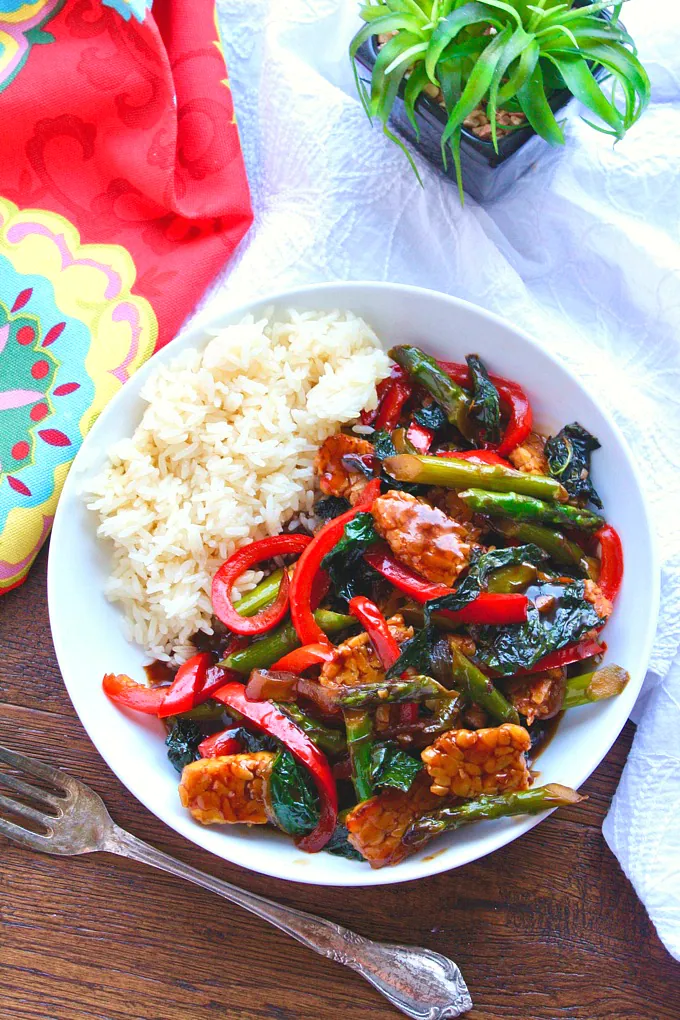 Tempeh and Vegetable Stir-Fry in Teriyaki Sauce is a delicious and colorful meatless meal. It's easy to make, too, which is welcome anytime!