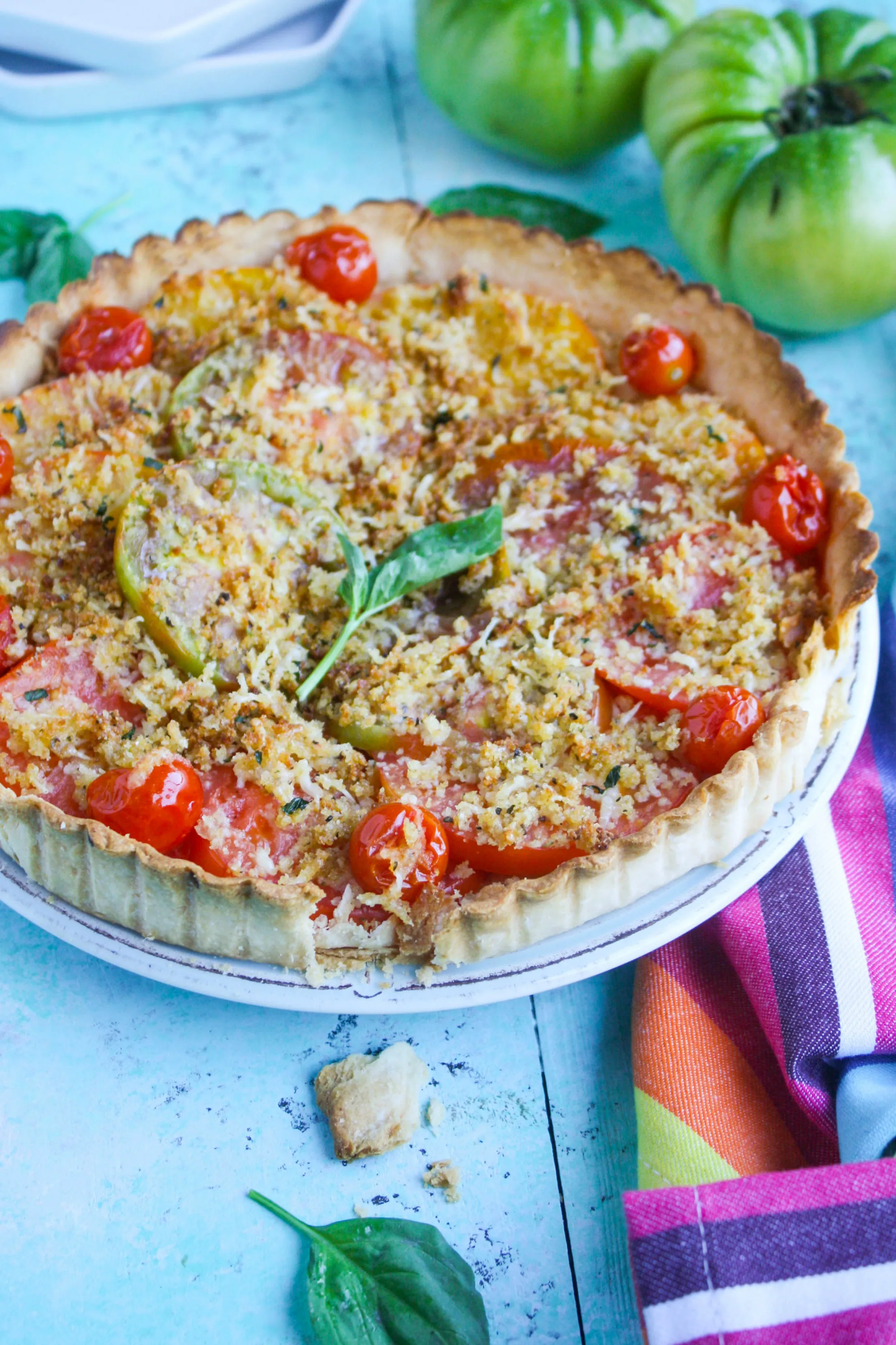 Tomato Tart with Cheesy Breadcrumbs is a wonderfully simple and flavorful dish you need to make before the summer is over! This simple tart is big on flavor.