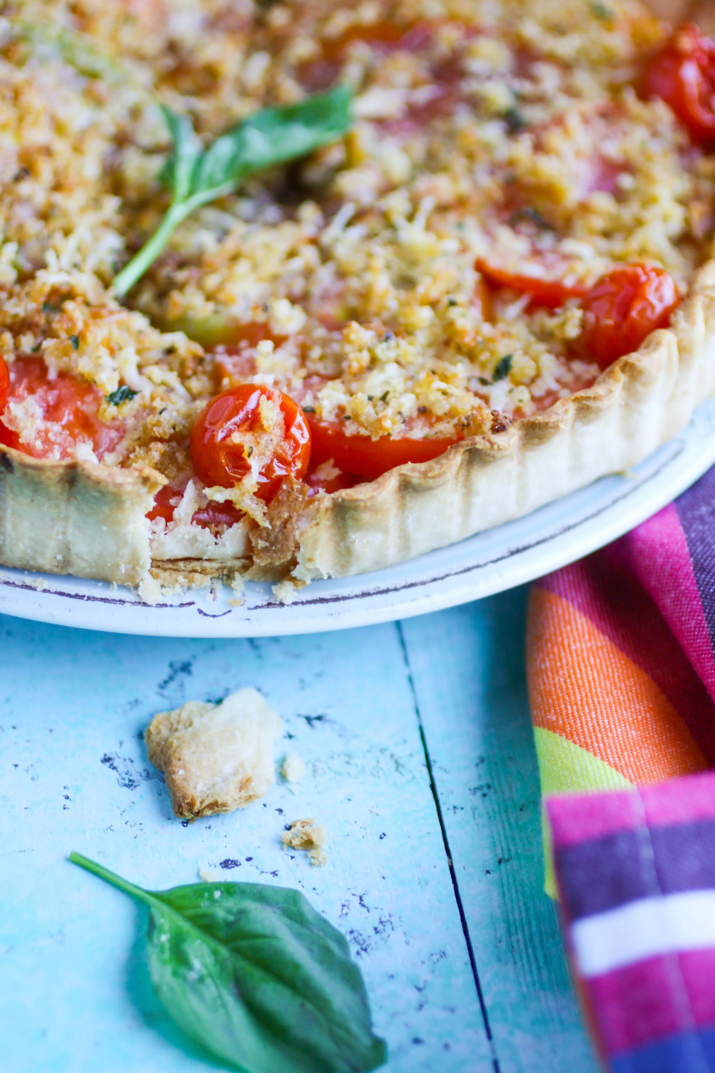Tomato Tart with Cheesy Breadcrumbs makes a wonderful, seasonal starter or part of a light meal. Serve this meatless dish all summer long! 