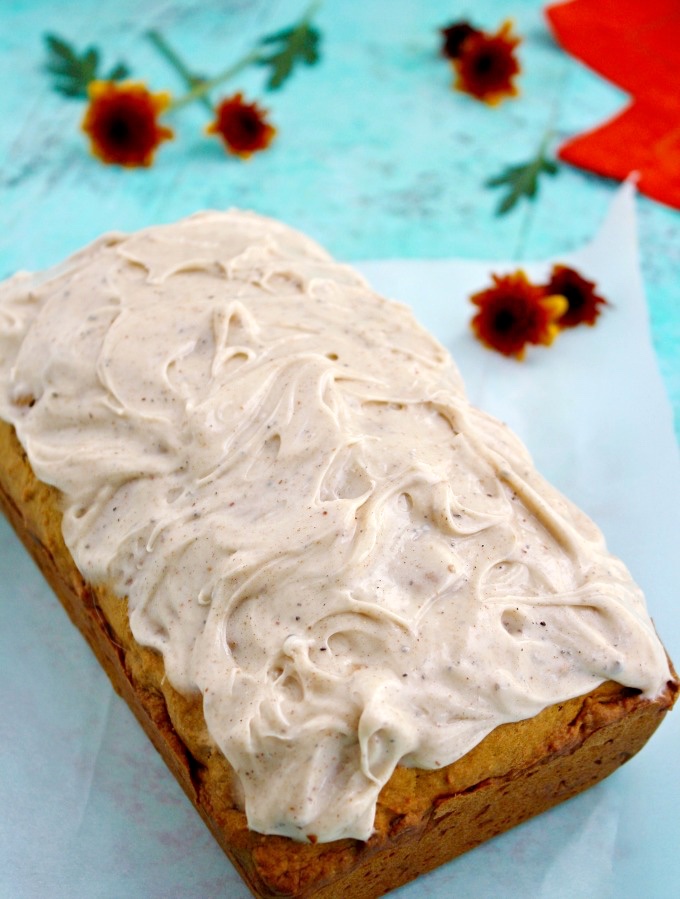 Almost ready to enjoy: Pecan-Pumpkin Bread with Chai Cream Cheese Frosting -- just sprinkle on a few chopped pecans and slice!