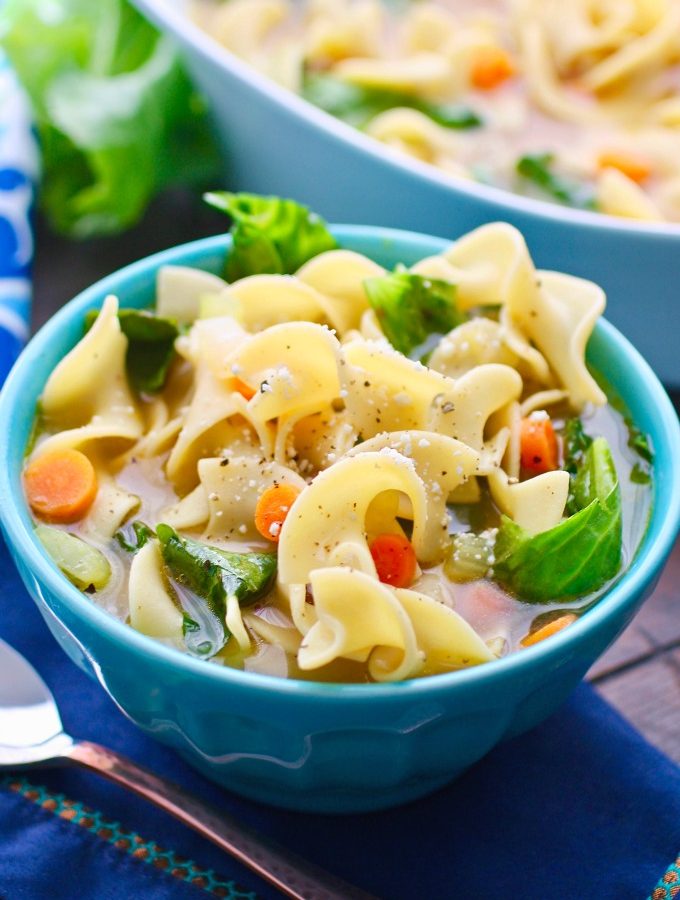 A big bowl of Vegetable Soup with Noodles and Greens is not only delicious, but just what you need when you're feeling sick.