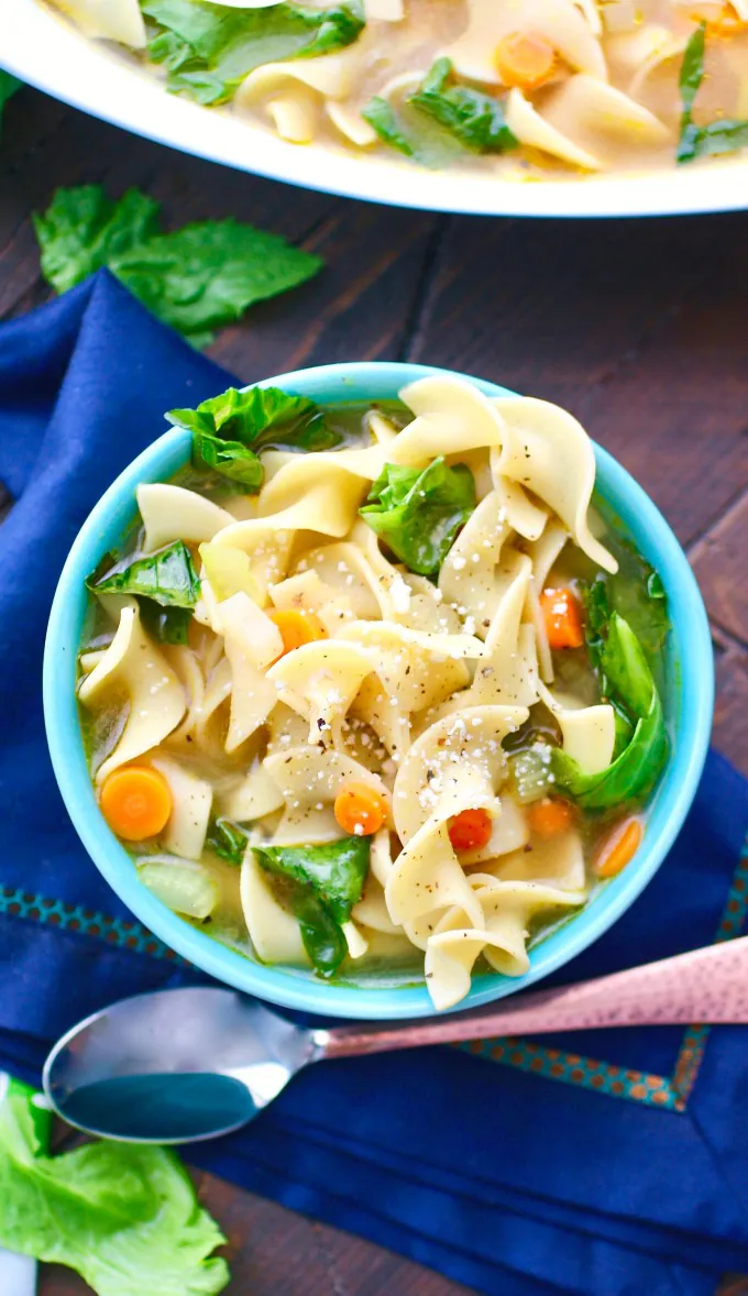 Sit down to a bowl of Vegetable Noodle Soup with Greens for a warming and delicious dish on a cold night!