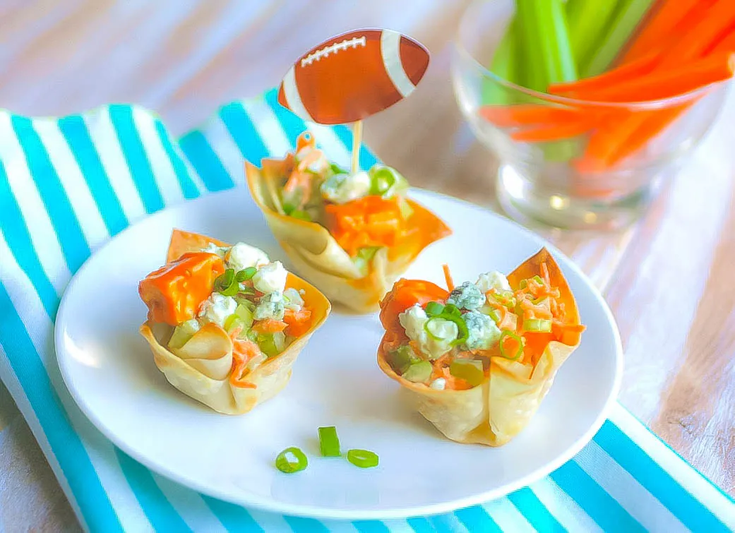 Vegetarian Buffalo Tempeh Wonton Cups make the perfect snack anytime. Vegetarian Buffalo Tempeh Wonton Cups are a meatless appetizer everyone will love.