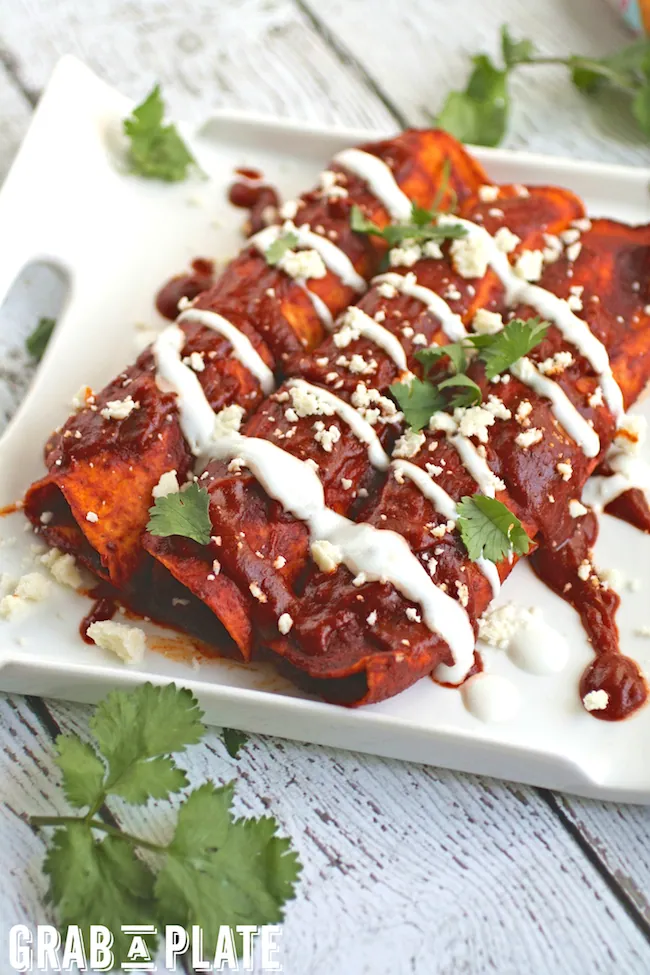 Mushroom and Kale Enchiladas with Red Sauce are not only delicious, but they're pretty on you're plate! These enchiladas are meatless, filling, and flavorful! 