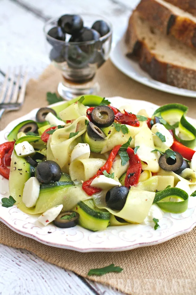 Fill up on a Mediterranean-inspired dish: Chilled Zucchini Ribbon "Pasta" with Black Olives, Roasted Red Peppers and Mozzarella