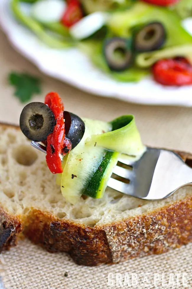 Twirl up a forkful of Chilled Zucchini Ribbon "Pasta" with Black Olives, Roasted Red Peppers and Mozzarella