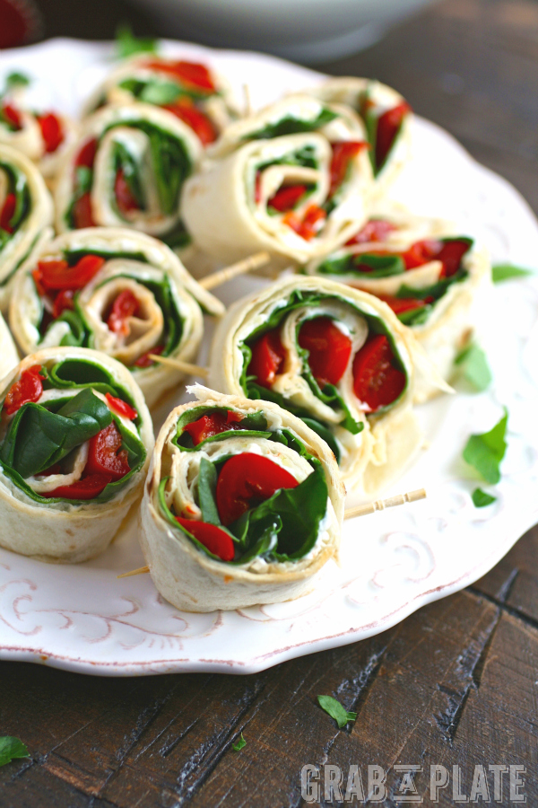 For an easy-to-make appetizer or snack, serve up Easy Swiss, Spinach, and Red Pepper Pinwheels!
