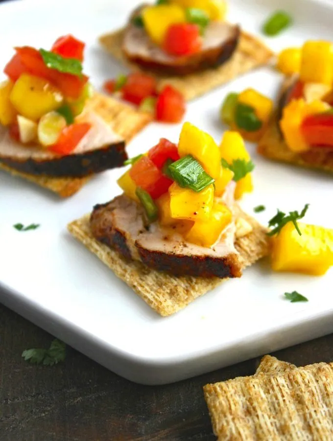 You'll love Pork Tenderloin Bites with Mango Salsa as a hearty and flavorful appetizer!