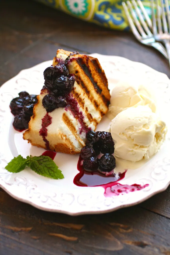 This simple dessert is a must try: Grilled Angel Food Cake with Roasted Blueberries - perfect for summer fun!