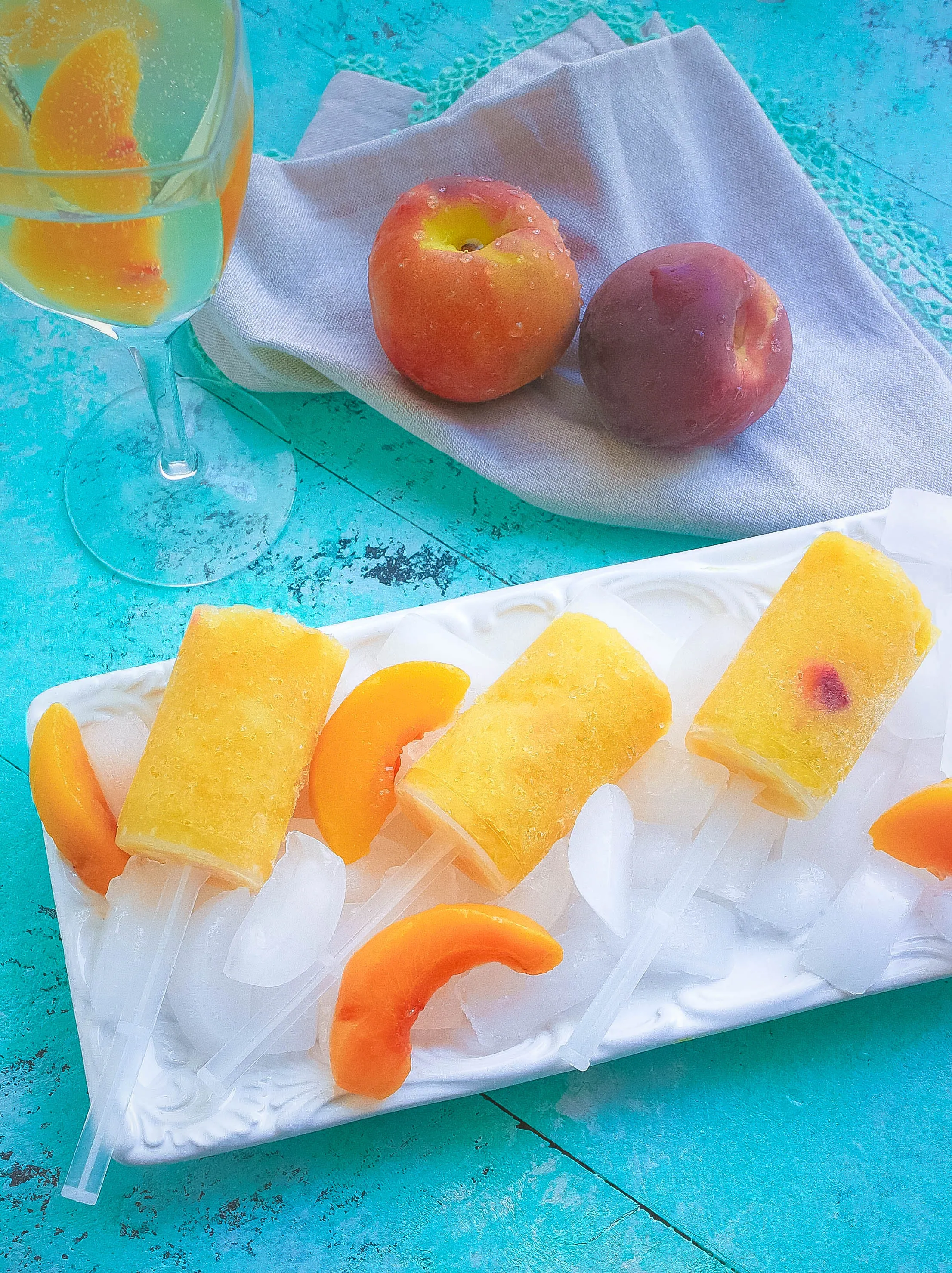 Frozen Peach Bellini Push Pops are true summer fun! Frozen Peach Bellini Push Pops are a great way to chill out on a hot day.