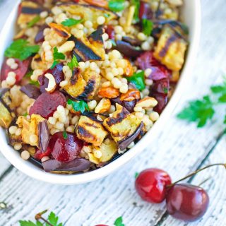 Grilled Eggplant, Cherries, and Couscous Salad is a great dish for the summer grilling season. Grilled Eggplant, Cherries, and Couscous Salad makes a great Meatless Monday dish!