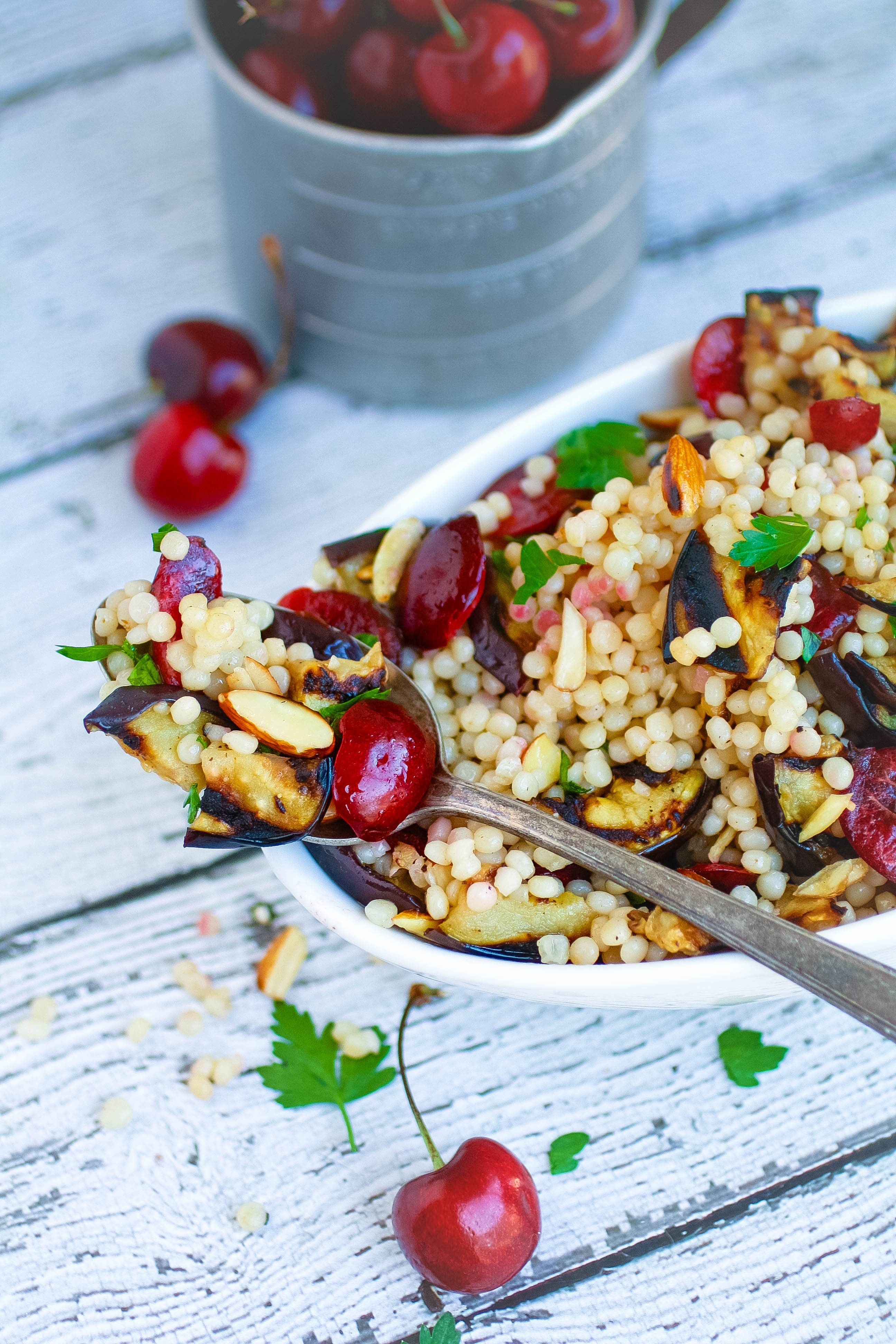 Grilled Eggplant, Cherries, and Couscous Salad is a delightful dish that you'll enjoy all season. Grilled Eggplant, Cherries, and Couscous Salad combines summer fruit with grilling for an amazing salad!