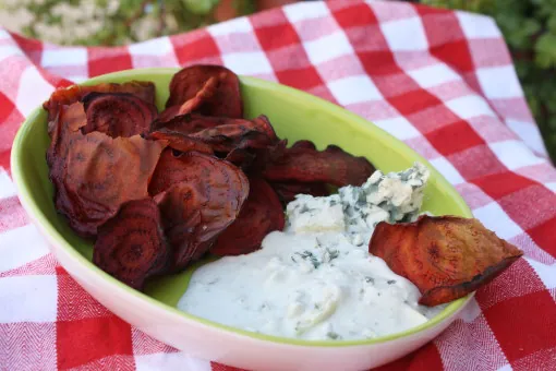 A plate of Baked Beet Chips with Blue Cheese Dip
