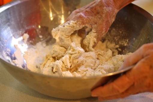 Mixing the dough for Focaccia with Tomato, Green Onion and Garlic