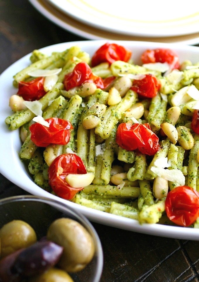 Kale Pesto Pasta with Roasted Tomatoes and White Beans is a simple, flavorful Meatless Monday (or any night of the week) meal!