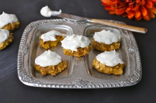 Pumpkin-oatmeal cookies with creamy goat cheese frosting
