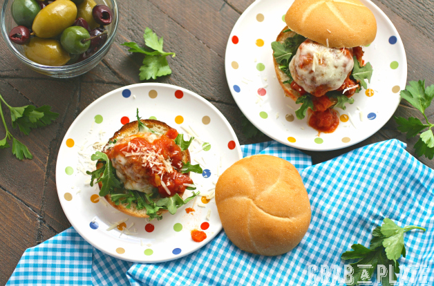 Serve sliders at your next gathering! Mozzarella-Stuffed Meatballs Sliders are tasty and fun!