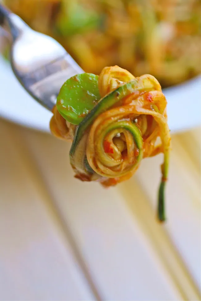 Zucchini pasta twirled up on a fork