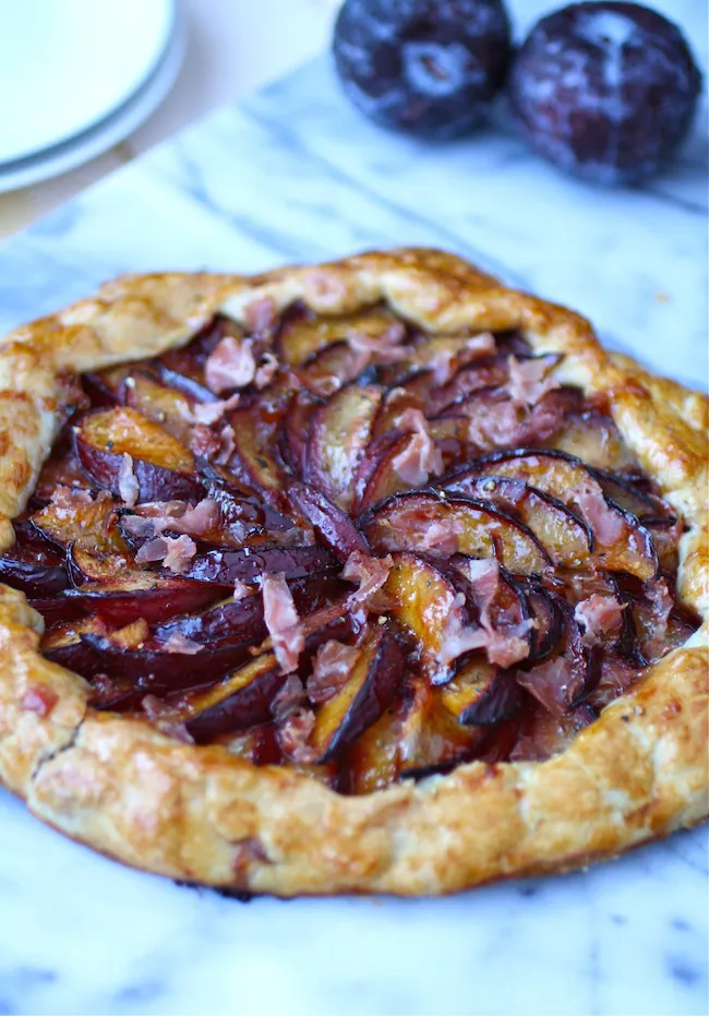 A whole Sweet and Savory Plum and Prosciutto Galette